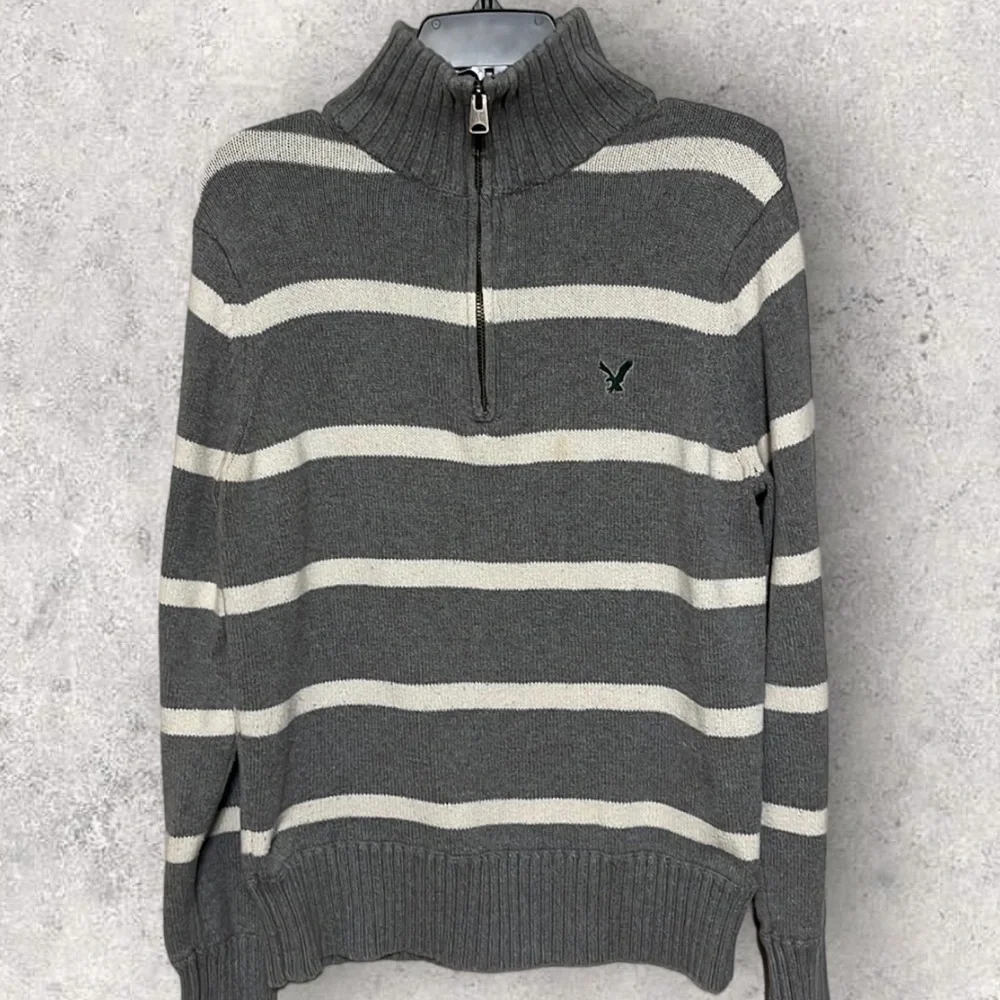 American Eagles gray stripe half zipper sweater. Large